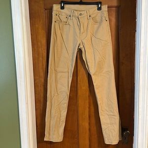 Tan Levi’s straight male jeans 32x32